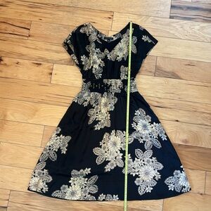 Silk dress. Grommet detail